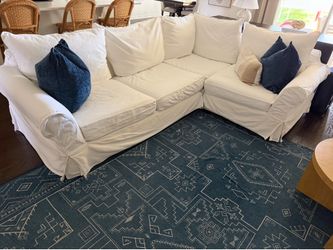 Pottery Barn white sectional couch