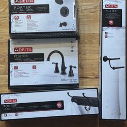 Delta Bathroom Fixtures - Faucet, Shower, Towel Rack