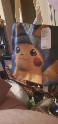 pokémon center  pikachu van gogh tote bag