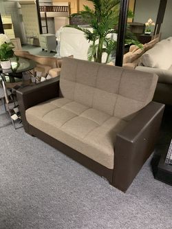 Brand new love seat with storage