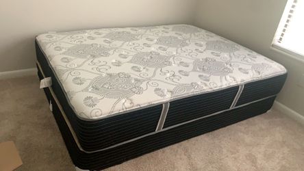 New queen mattress and box spring 2 pc bed frame is not included