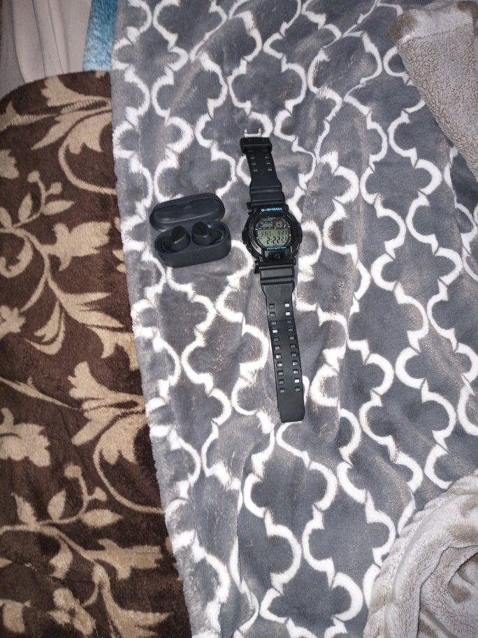 Bluetooth Headphones And a Watch