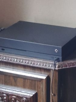 Xbox one X with controller and all cables..like new