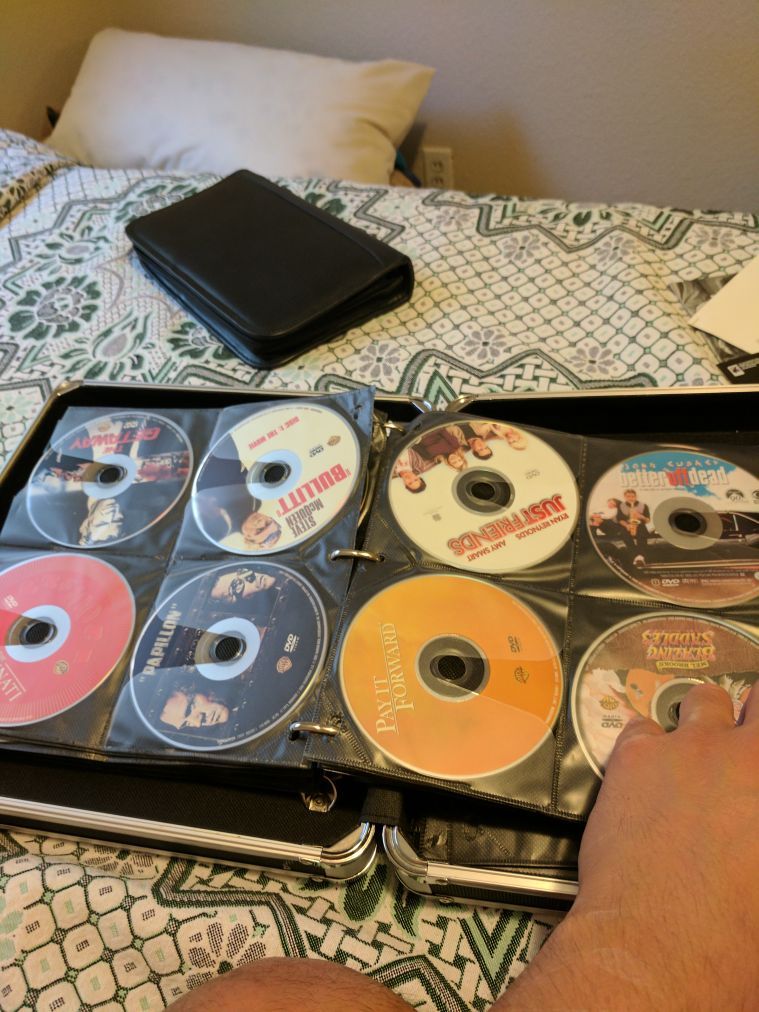 100+ movies -DVD - With locking Carry Case