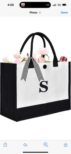 Elevate your daily style with this chic personalized monogram tote bag. Crafted from durable canvas with a classic black and white design, this tote f