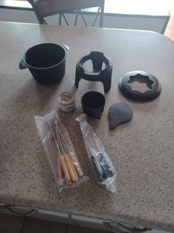Brand new cast iron fondue set