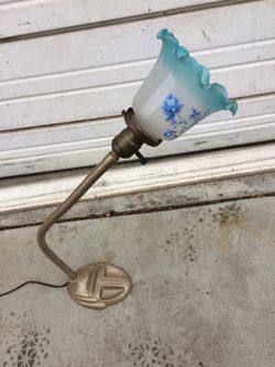 Desk lamp with blue flowered glass