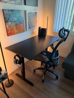 Adjustable desk and ergo chair