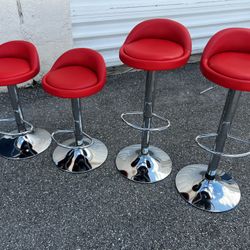 $125 for all 4! 4 Modern Red Chrome Based Swivel Adjustable Height Bar Stools! Seat height adjusts 23-31in 