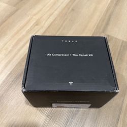 New Tesla Air Compressor And Tire Repair Kit