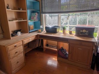 We're moving and can't take this loved Fantastic solid pine desk with lots of storage and space