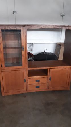 Wood entertainment center glass door glass shelves