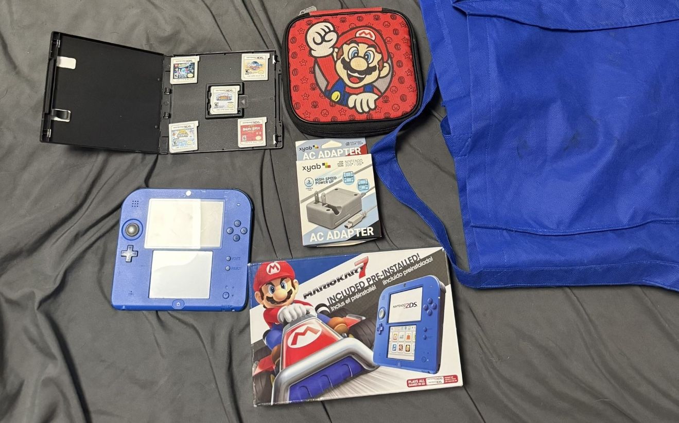 Nintendo 2DS, 2DS Charger, 3ds Box With 6 3DS Games and one Ds game