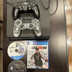 ps4 with three games and extra controller