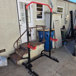 Squat rack with landmine attachment