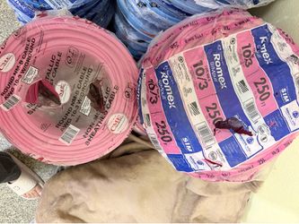 250 ft. 10/3 Solid Romex SIMpull CU NM-B with G Wire Pink Coil