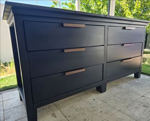 Rustic solid wood dresser.