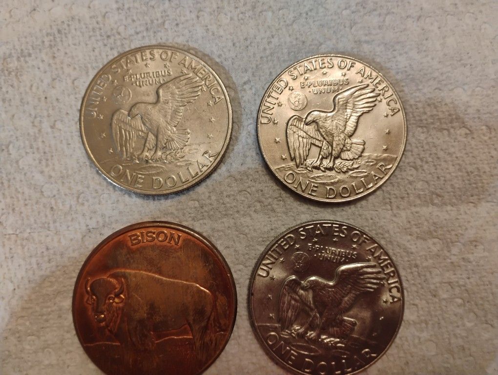 3 1dollar Coins And 1 Bison