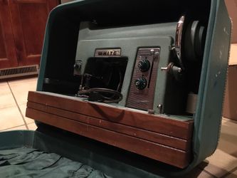 Vintage White Sewing Machine w/ matching leather Case.