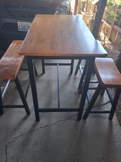Walnut and black table bech and seats