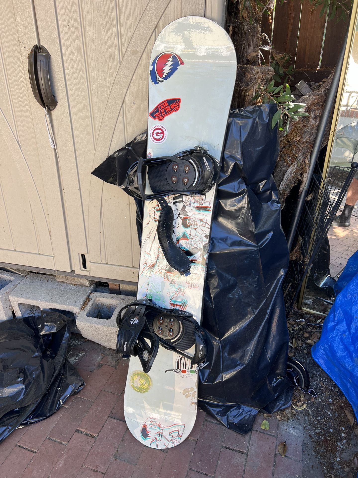 Ride Brand Snowboard (H60inxW12in) with Burton Cartel Bindings (rust damage) and Lavar Board Bag