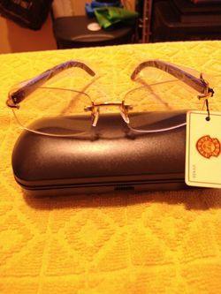 Rimless prescription eye glasses, unbranded.