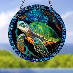 Stained glass acrylic suncatcher, sea turtle design, blue stone circle.