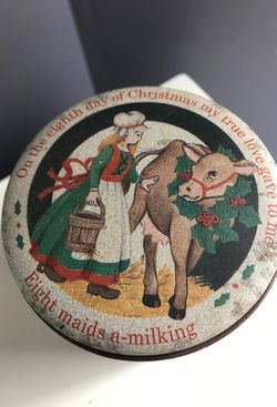 Vintage Christmas tin can with lid