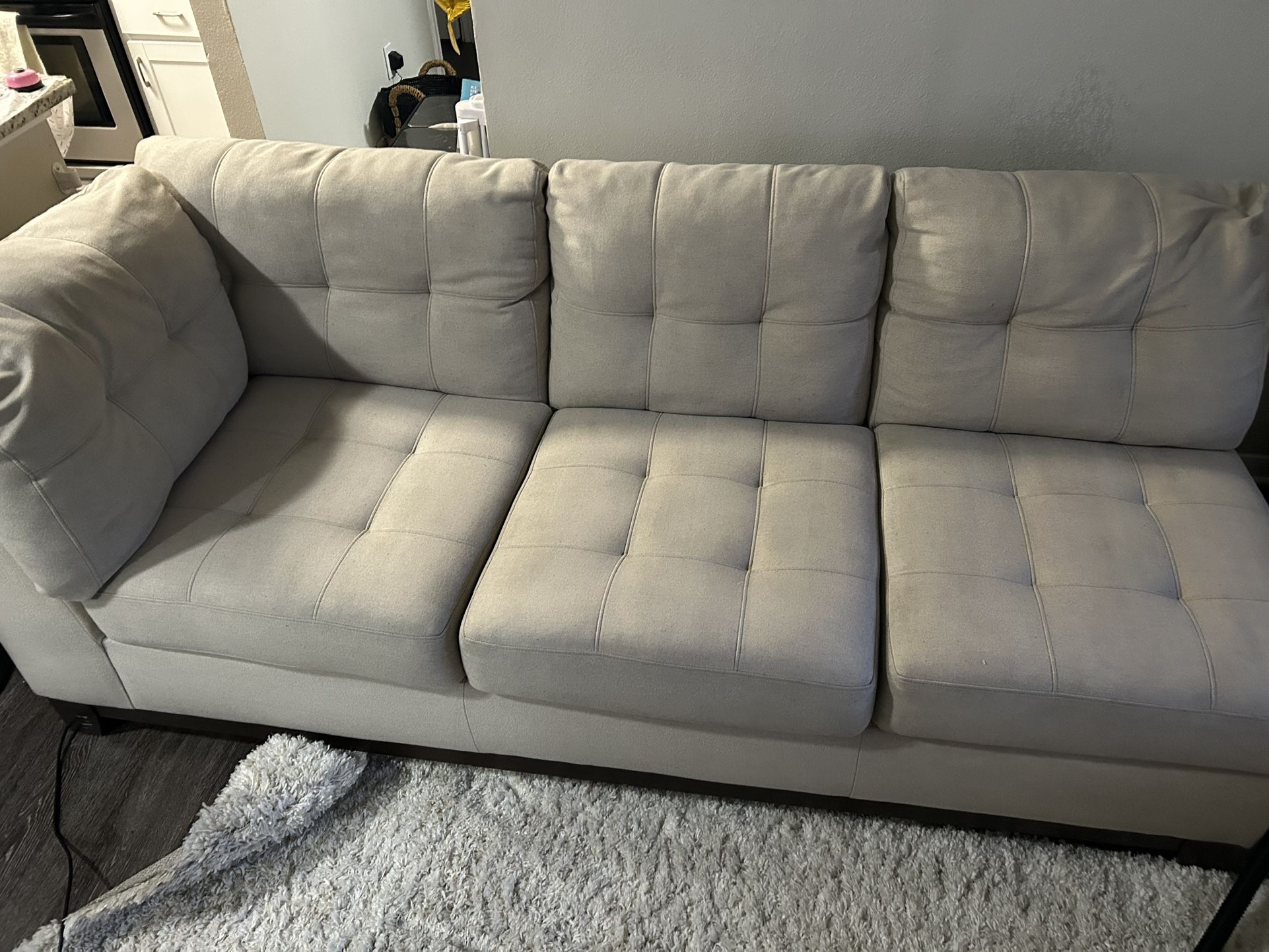 Selling my beige L-shaped sectional!