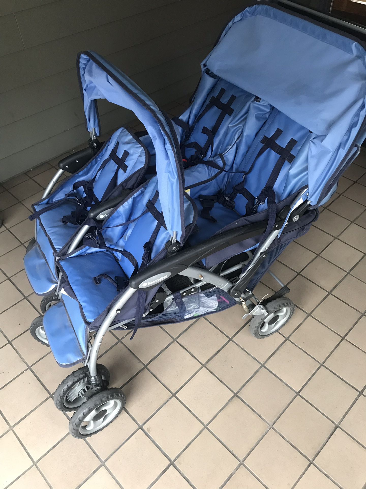 Foundations four child stroller
