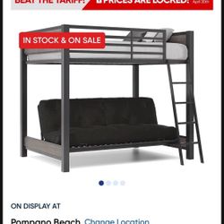 Rooms To Go twin loft bunk bed with black futon and Twin Mattress On Top