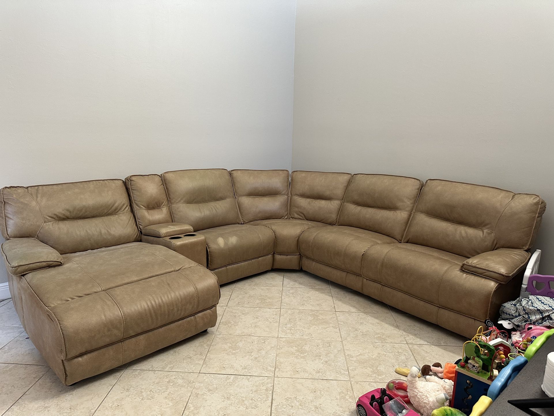 Rooms To go Faux Leather Sectional Couch With Chaise