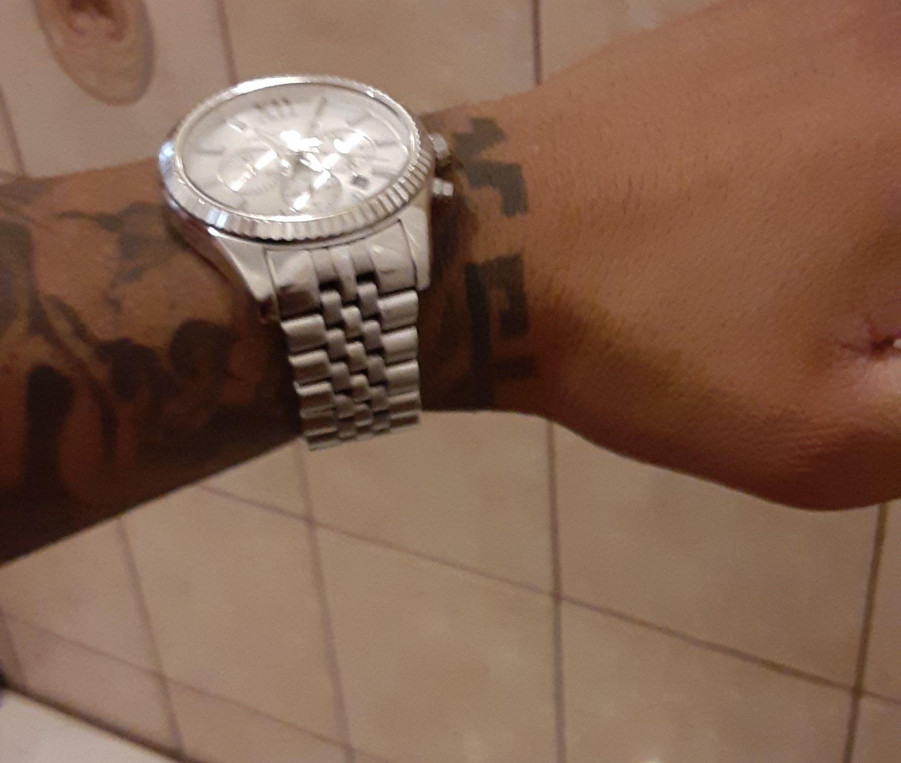 Michael kors watch and guess watch