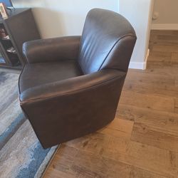 Brown leather swivel chair
