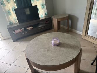 Tv stand and two night stands and a table