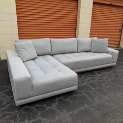 Free Delivery - Soft Floating Modular Sectional Couch from Rooms To Go