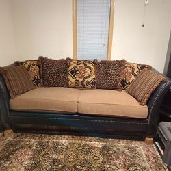 Comfortable Elegant Sofa. Leather And Cloth