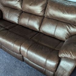 Brown Leather Sofa.  Reclines