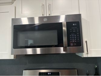 New in box GE microwave