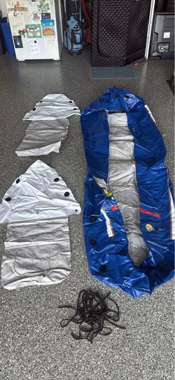 Inflatable kayak Deflated with Cover Panels and Rope