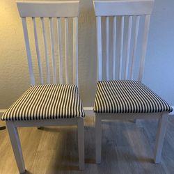 Two White Chairs
