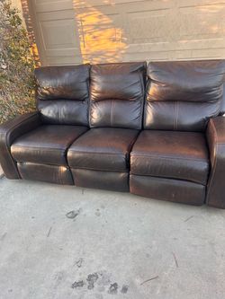Black leather recliner couch