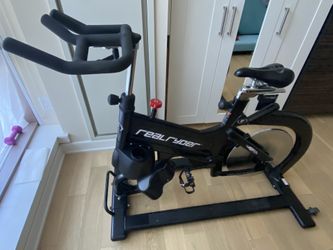 Leaning RealRyder Indoor Cycling Bike