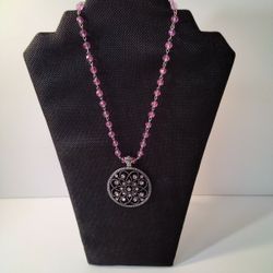 A Beautiful Pink And Silver Necklace.