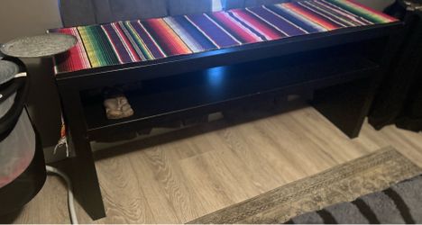 $40 firm long black table 55” w x 15” d
