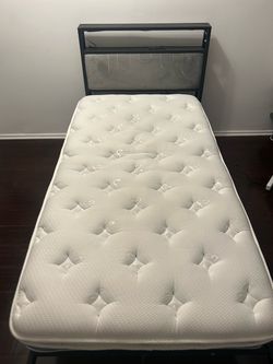 Twin size bed with mattress