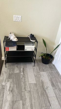 Black shoe rack new $10