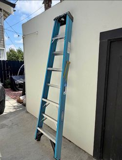 blue fiberglass 8 ft ladder and fiberglass blue 4 ft ladder