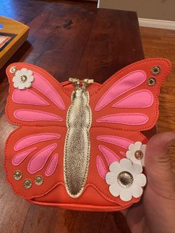 BUTTERFLY BACKPACK PURSE WITH FACE &EYE ROLLER