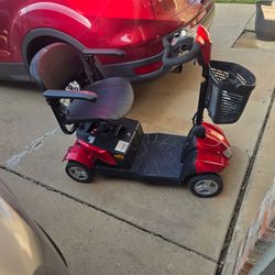 Red mobility scooter